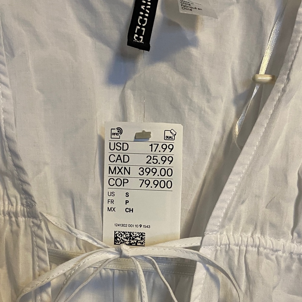 Divided White Sleeveless Top with Tie Detail - Picture 2 of 7